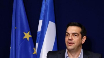 Greek PM Tsipras addresses a news conference after a EU leaders summit in Brussels