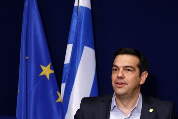 Greek PM Tsipras addresses a news conference after a EU leaders summit in Brussels