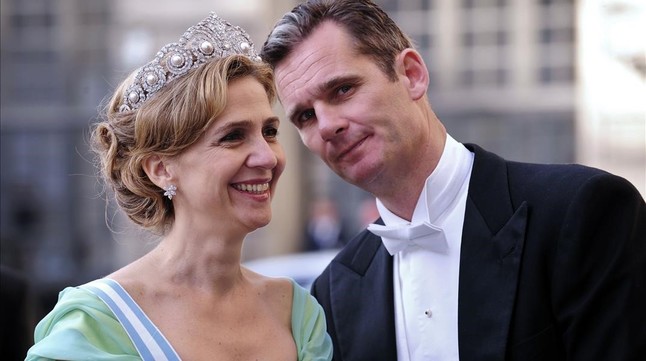 FILES  A file picture taken on June 19  2010 shows Infanta Cristina of Spain  L  and her husband Inaki Urdangarin arriving at the wedding banquet of newly-wed Swedish royal couple  Crown Princess Victoria and her husband Daniel Westling at the Royal Palace of Stockholm  A smiling  educated  mother-of-four who was madly in love with her dashing husband  Infanta Cristina had it all until a royal fraud scandal saw her plunge from Spanish darling to national  baddie   Cristina  the sister of King Felipe VI  and her husband  former Olympic handball player Inaki Urdangarin  will go on trial on January 11  2016 for corruption in a high stakes case that risks inflicting further damage to the image of the Spanish monarchy     AFP PHOTO  ATTILA KISBENEDEK    TO GO WITH AN AFP STORY BY LAURENCE BOUTREUX